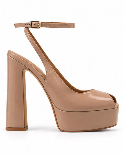 VIVACE Isadora beige patent platform sandal, side profile showing the peep toe, elevated platform, tall block heel and ankle strap.