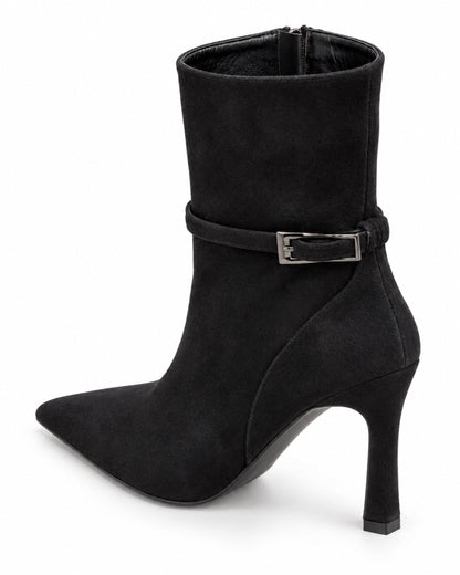 Vivienne Suede Buckle Ankle Boot in black by VIVACE, three-quarter back view showing the heel and curved side stitching.